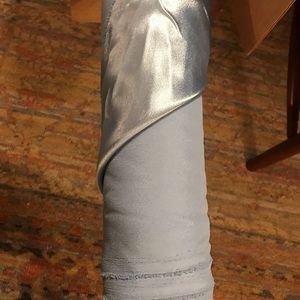 Lovely light blue satin material. “Heavy crepe back satin coppen”: fabric.com